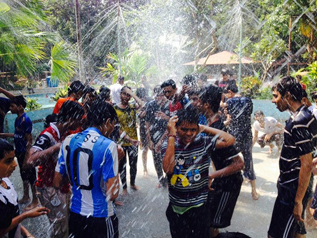 Students enjoying a fun water activity together